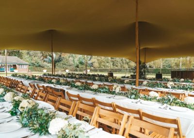 Table display under chino stretch tent