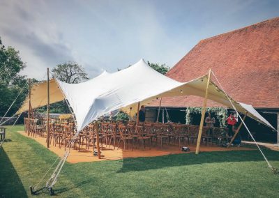 White stretch tent with coconut matting