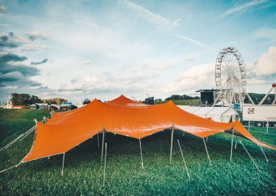 Big orange stretch tent at fairground