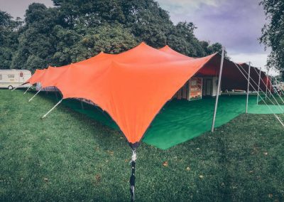 Orange stretch tent with sides down