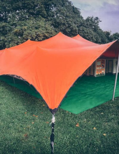 Orange stretch tent with sides down