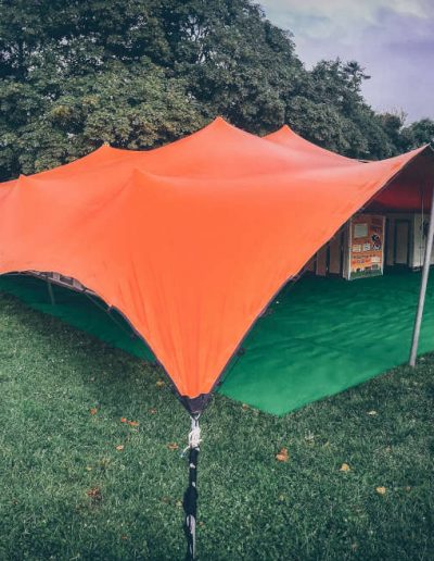 Orange stretch tent with sides down