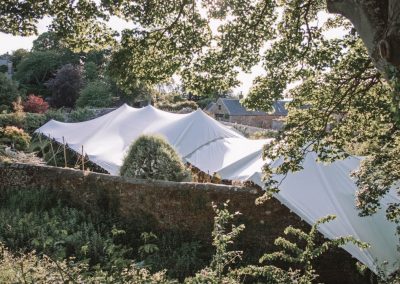 White stretch tents over a wall