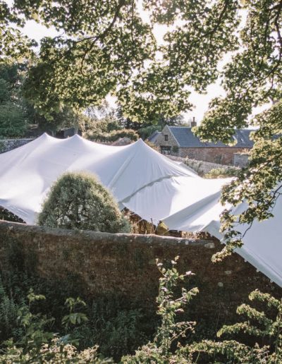 White stretch tents over a wall