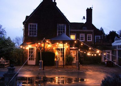 black stretch tent with festoons