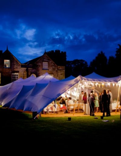 white stretch tent with festoons