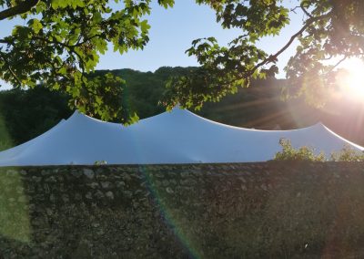 white stretch tent over wall