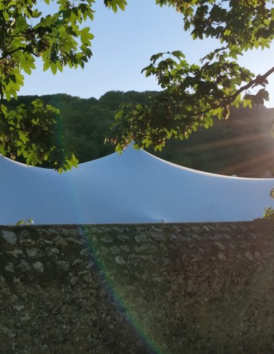 white stretch tent over wall