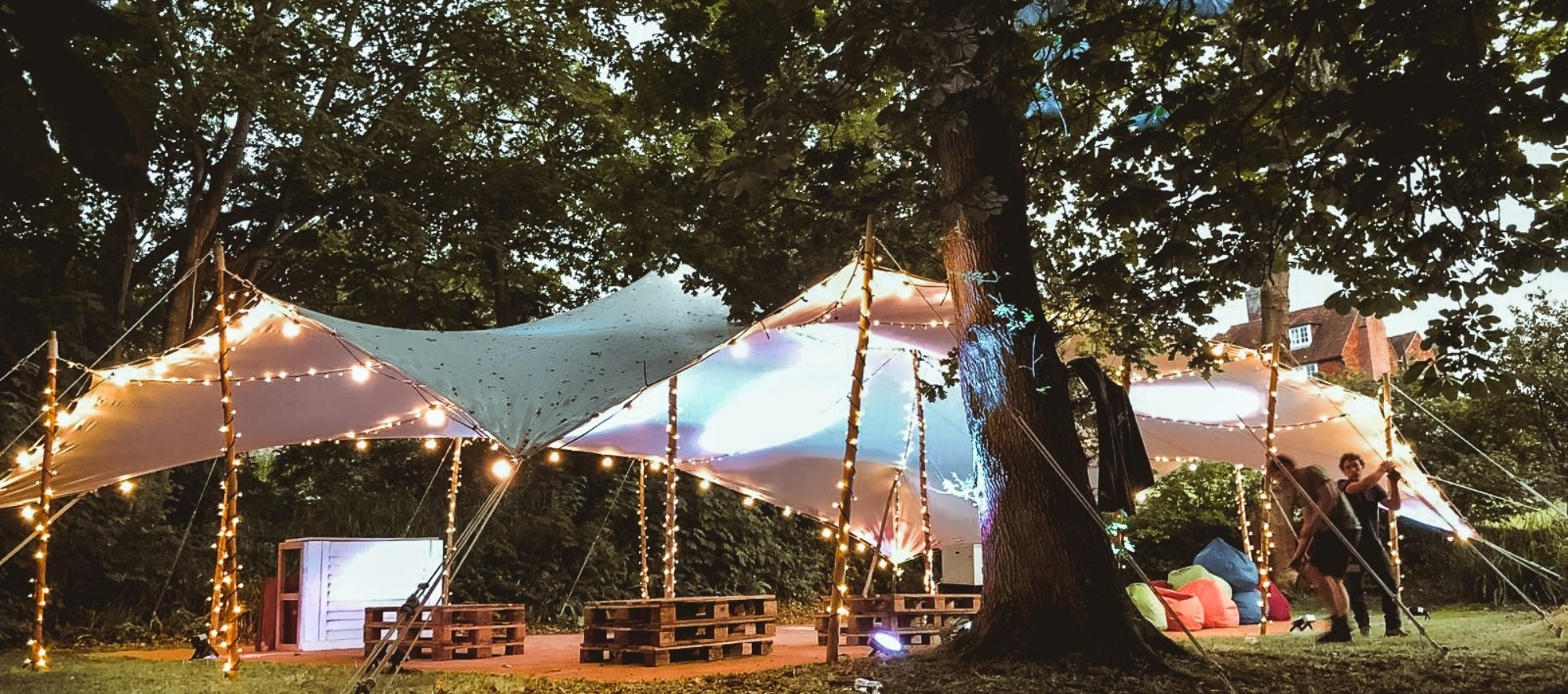 How Lighting Transforms Your Event Under A Stretch Tent